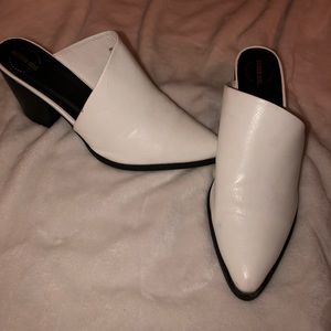 White snakeskin mules